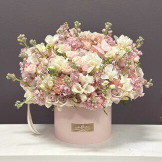Small Size Arrangment with Mixed Light Color Flowers