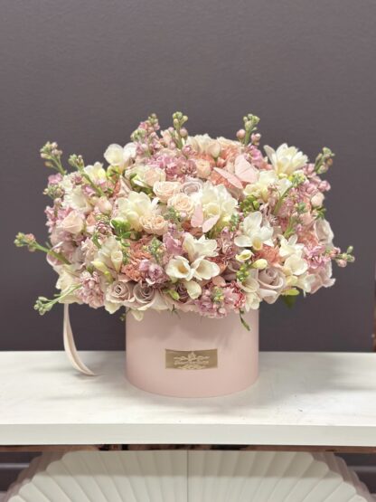 Small Size Arrangment with Mixed Light Color Flowers